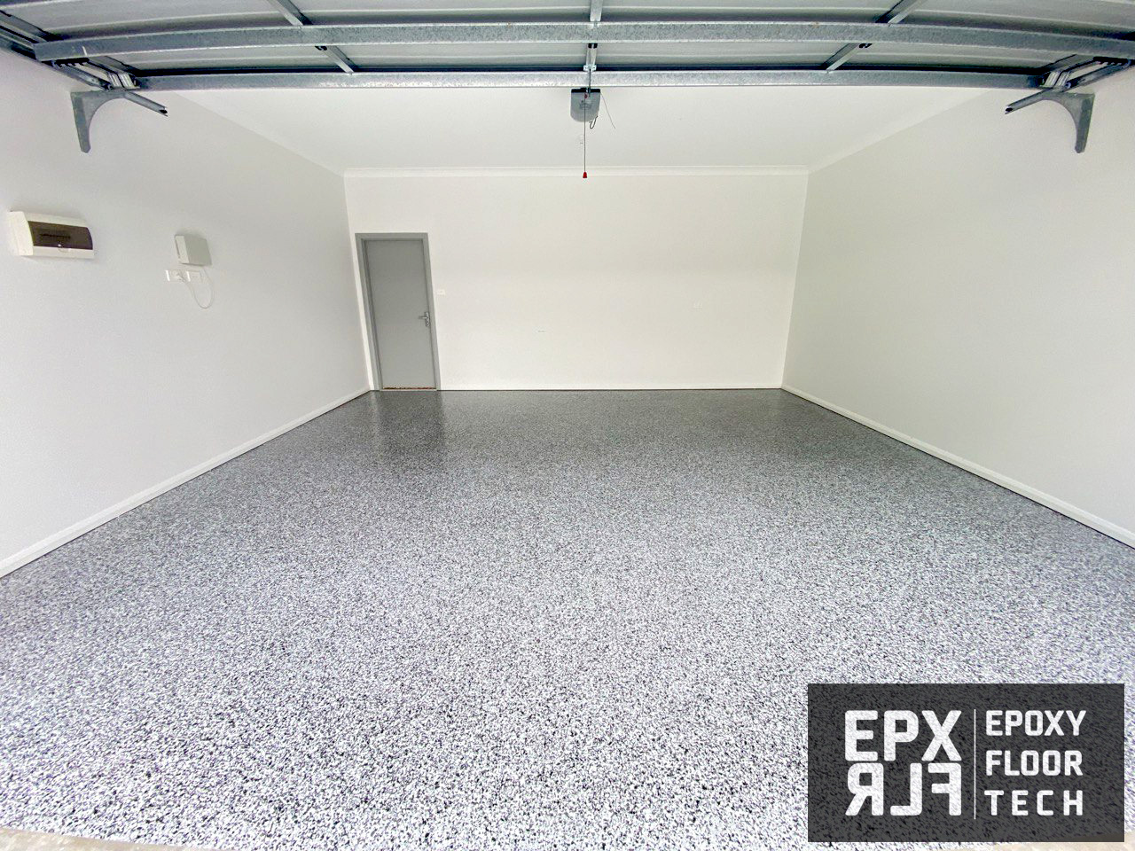 solid-white-colour-epoxy-garage-flooring double-garage-full-flake-flooring-Gosford