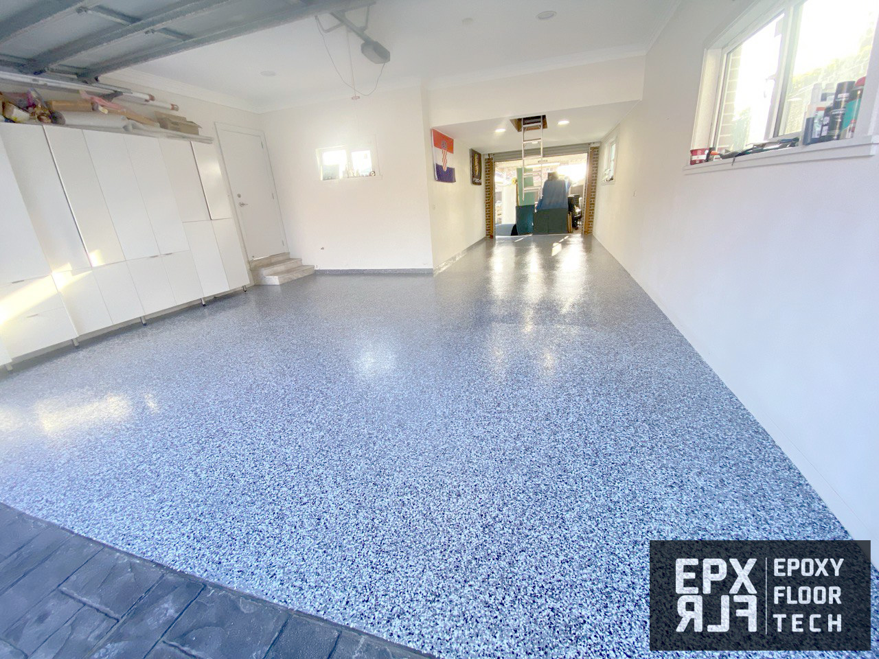 solid-white-colour-epoxy-garage-flooring flake-floors-garage-epoxy-painting-Campbelltown