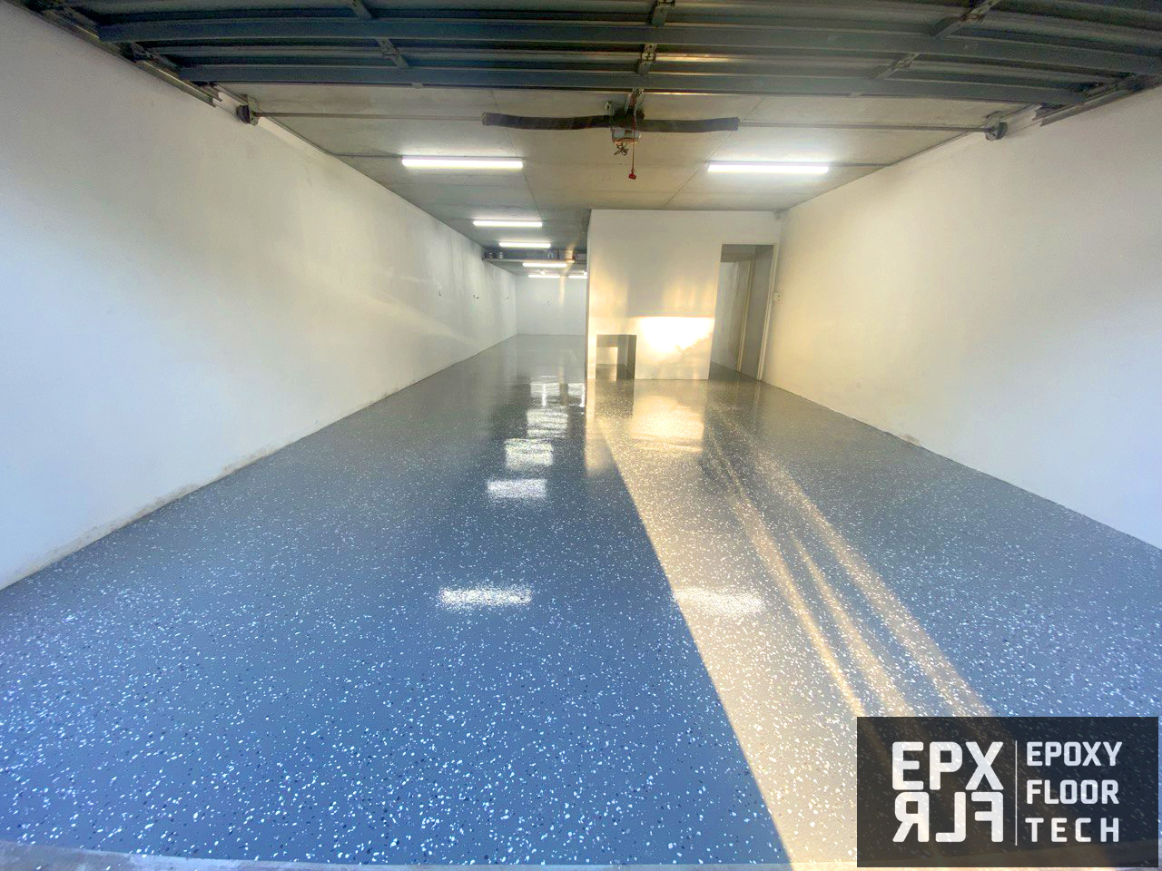 solid-white-colour-epoxy-garage-flooring partial-premium-flake-epoxy-floors-mid-grey-base-coat